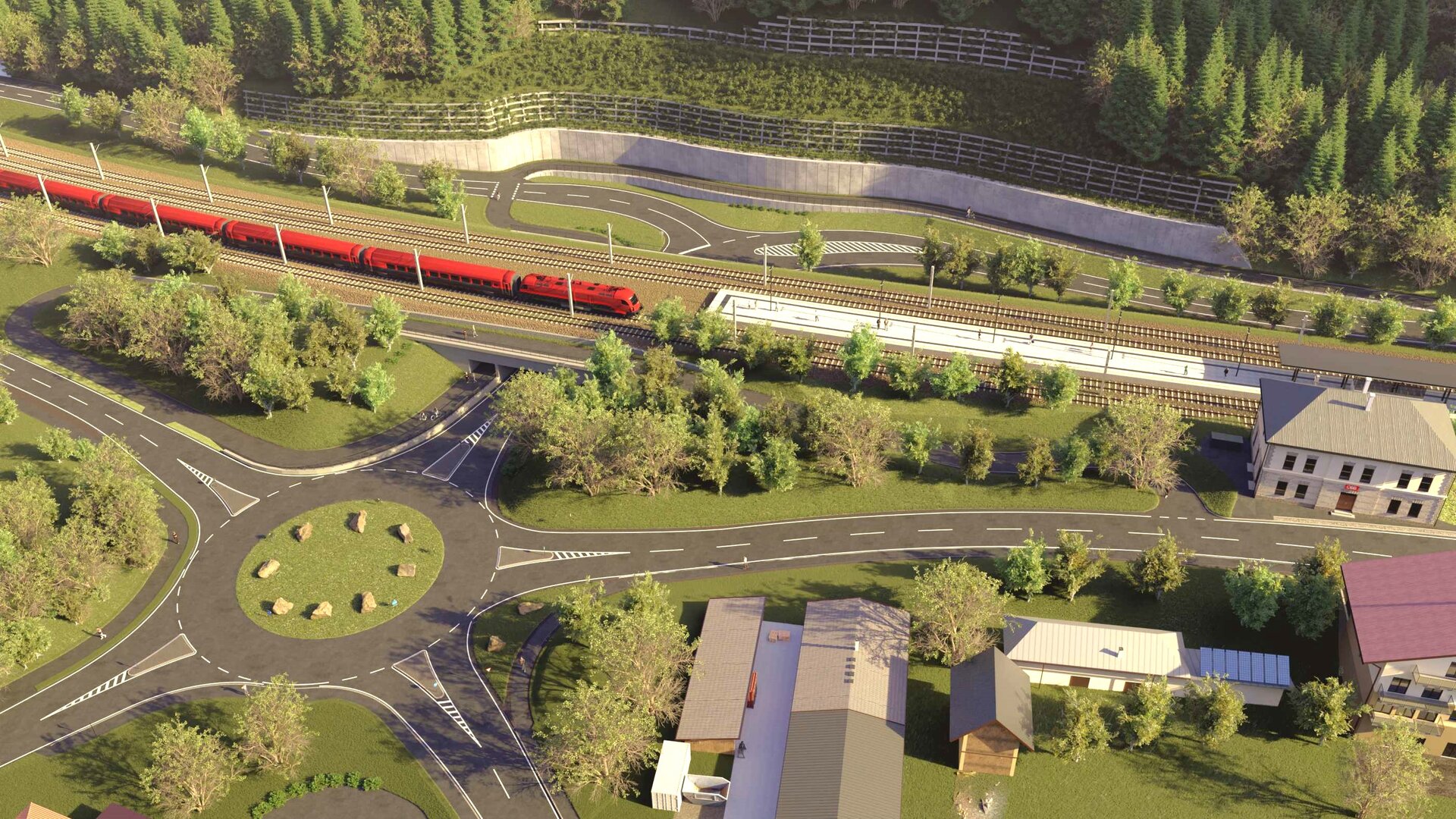 Roter Zug fährt auf Gleisen bei einem Kreisverkehr mit Bäumen und einem Bahnhofsgebäude.